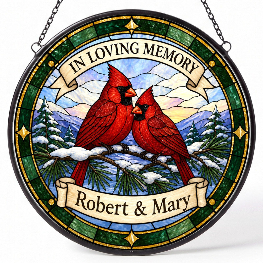 Cardinal pair memorial suncatcher hanging in a window